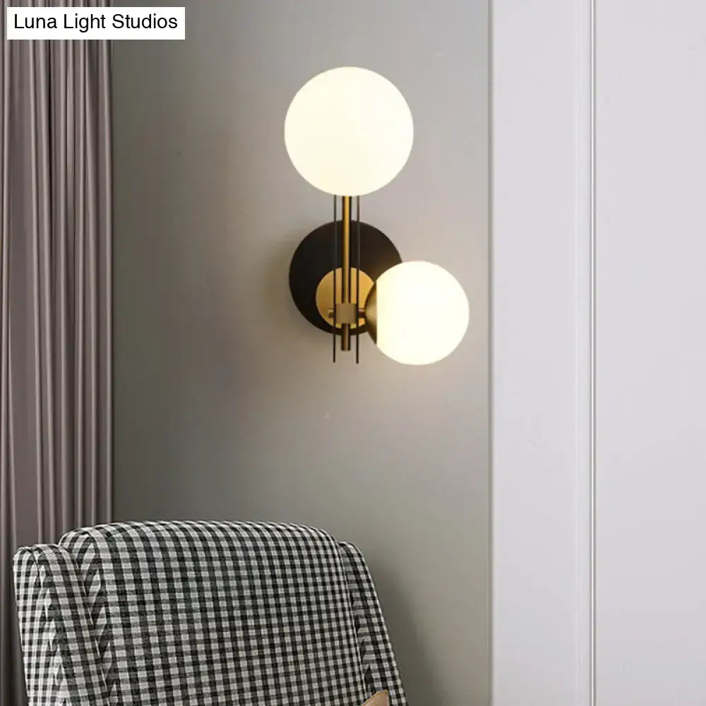 Black Gold Wired Glass Light wall sconce with dual frosted glass globes Decorbites on Tampa Home & Garden Store