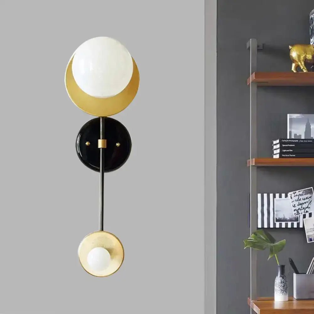 Black Gold Glass Wall Sconce Two-Light Milky Decorbites with gold accents on Tampa Home & Garden Store