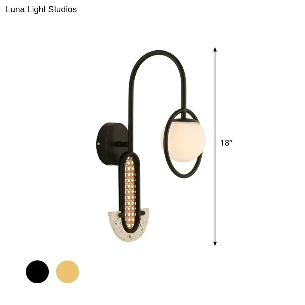 Gold Black Opal Glass Sconce by Decorbites; black metal wall light with round opal glass shade on Tampa Home & Garden Store
