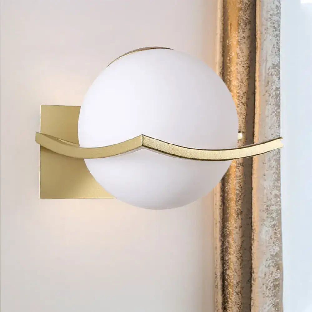 Gold Opal Globe Sconce by Decorbites with curved gold band and square backplate on Tampa Home & Garden Store
