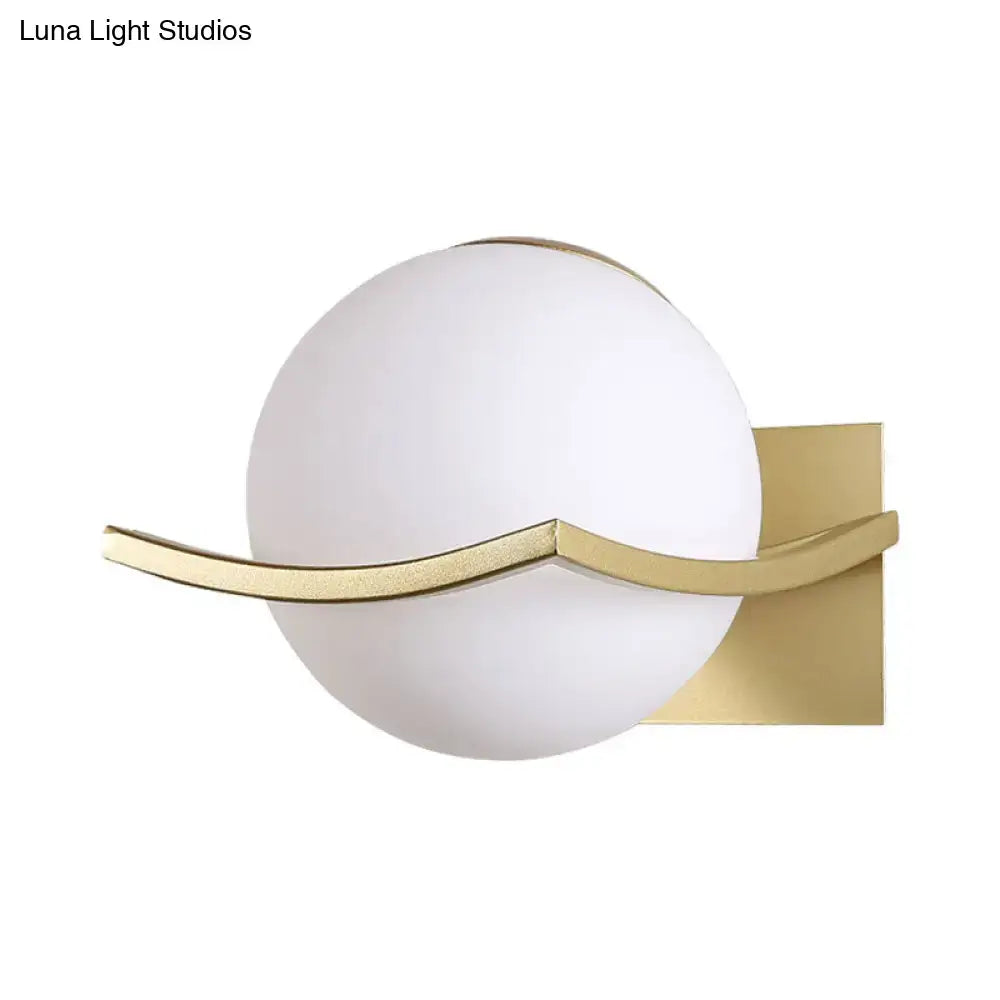 Gold Opal Globe Sconce with curved brass band by Decorbites on Tampa Home & Garden Store