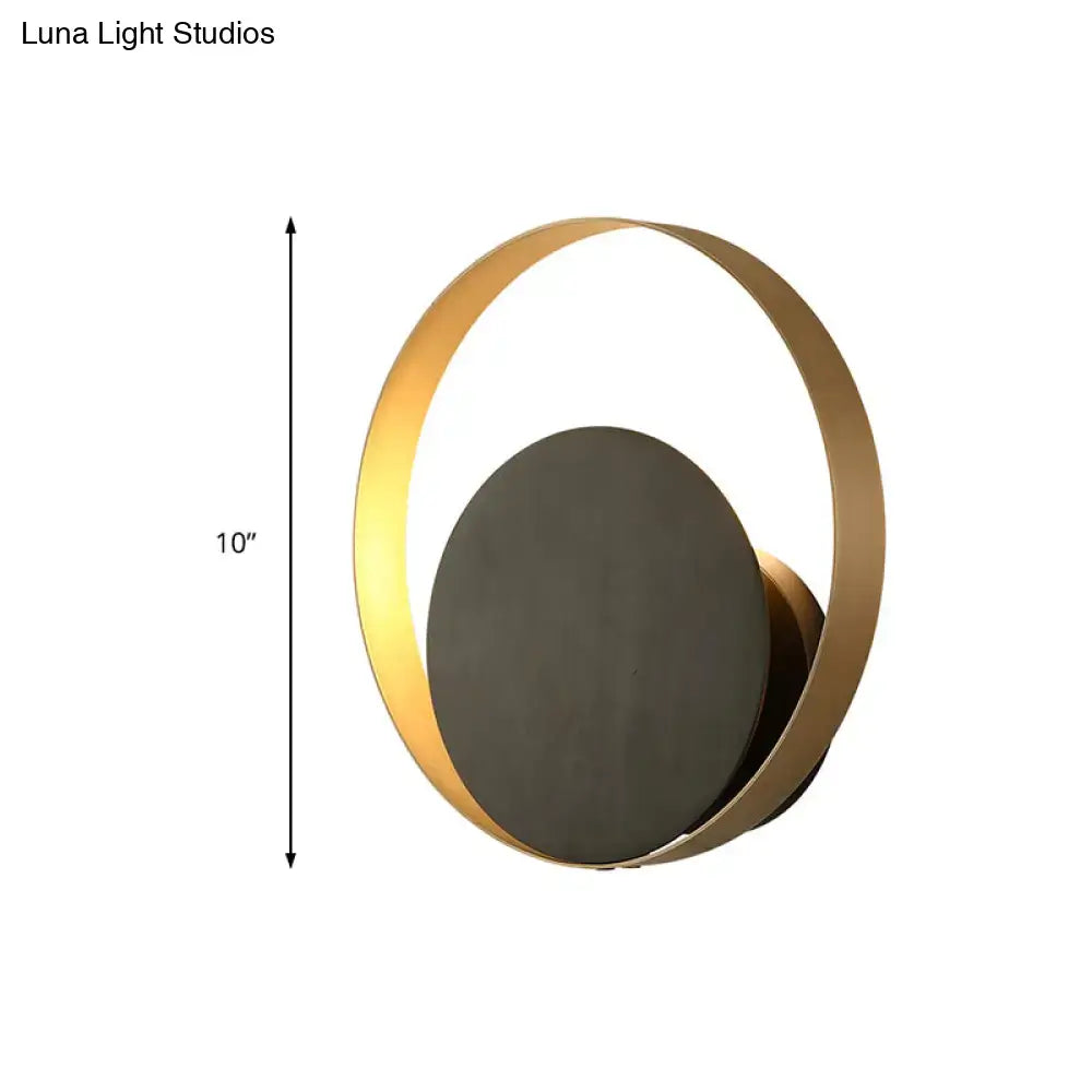 Decorbites Gold Orbit Sconce Light with circular gold ring and dark disk, 10 inches tall on Tampa Home & Garden Store