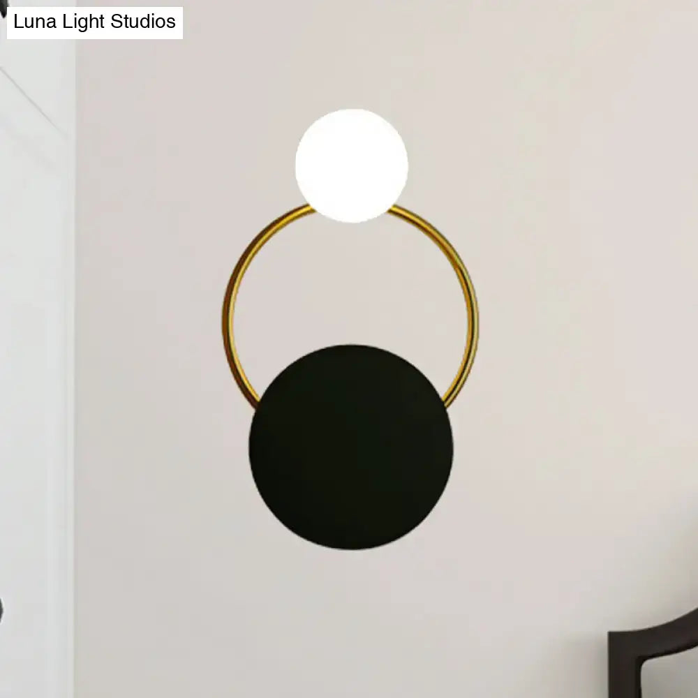 Black Gold Round Glass Sconce by Decorbites; gold ring with white globe and black disk on Tampa Home & Garden Store