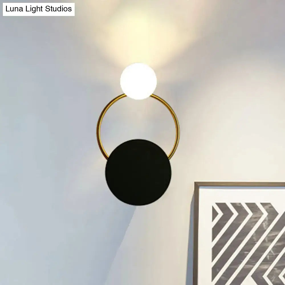 Black Gold Round Glass Sconce with black disk, gold ring and white globe by Decorbites on Tampa Home & Garden Store