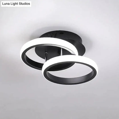 Black Gold Spiral Lamp ceiling light with two interlocking black and white circular rings on Tampa Home & Garden Store
