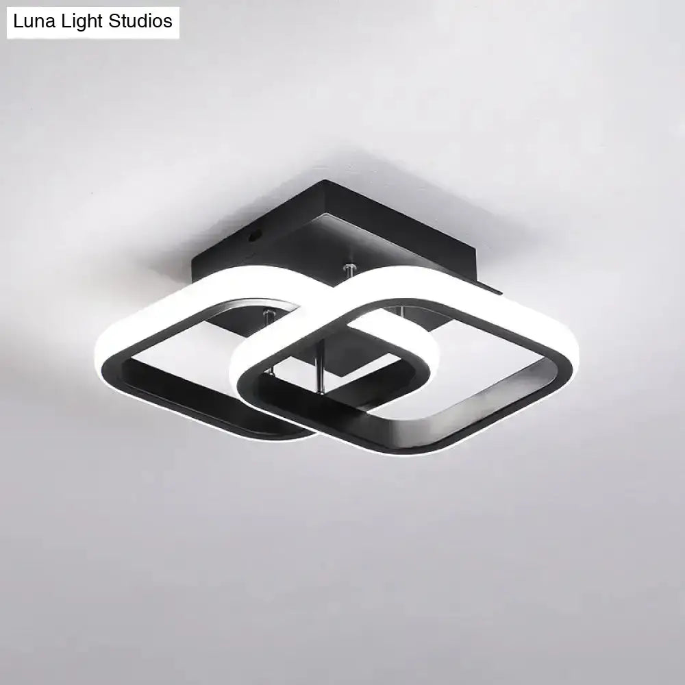 Black Gold Spiral Lamp ceiling light with interlocking square loops by Decorbites on Tampa Home & Garden Store