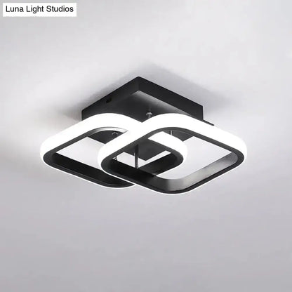 Black Gold Spiral Lamp ceiling light with interlocking square loops by Decorbites on Tampa Home & Garden Store
