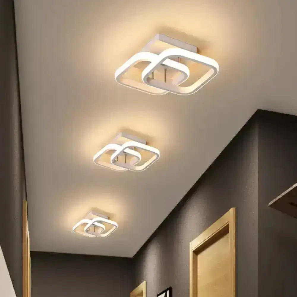 Black Gold Spiral Lamp ceiling light fixture with white interlocking square loops Decorbites on Tampa Home & Garden Store
