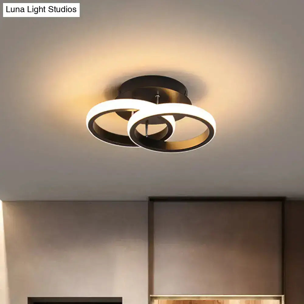 Black Gold Spiral Lamp ceiling fixture, Decorbites metal rings with warm glow on Tampa Home & Garden Store