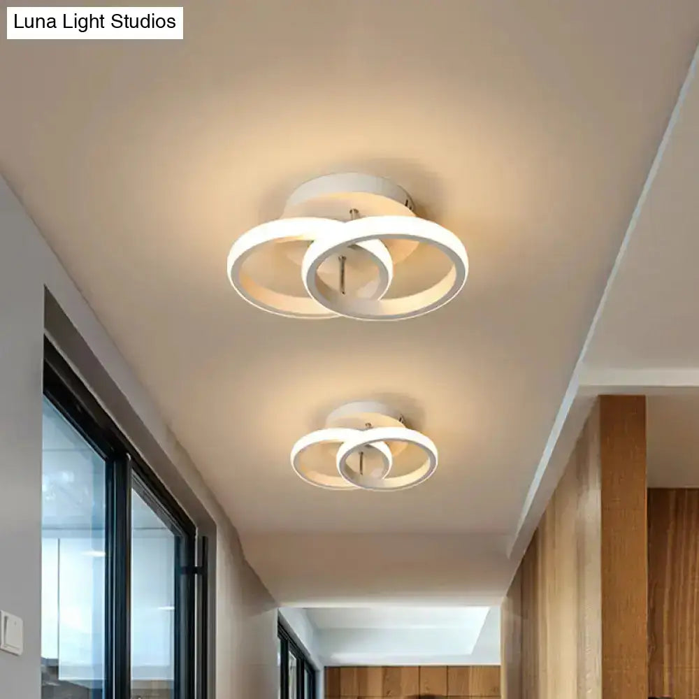 Decorbites Black Gold Spiral Lamp ceiling light with white circular rings pair shown in hallway on Tampa Home & Garden Store