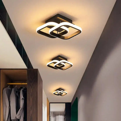 Decorbites Black Gold Spiral Lamp ceiling light with interlocking square rings; trio in hallway on Tampa Home & Garden Store