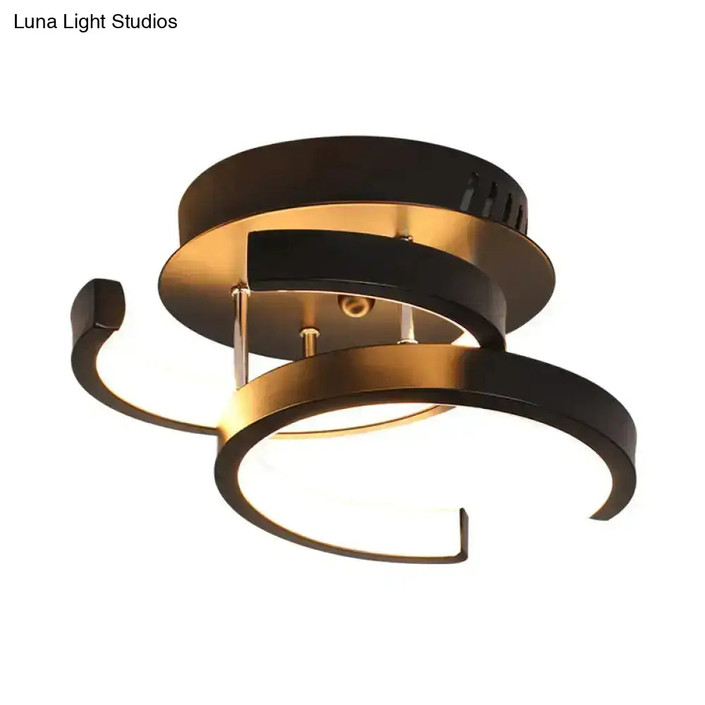 Black Gold Spiral Lamp ceiling light with overlapping gold rings and black metal finish on Tampa Home & Garden Store
