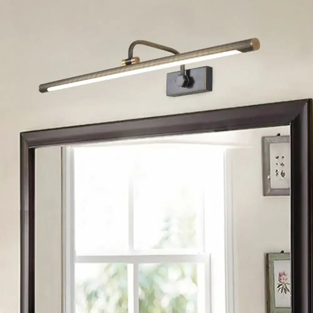 Decorbites Black Gold Swing Wall Light, slim LED bar with brass accents above a mirror on Tampa Home & Garden Store