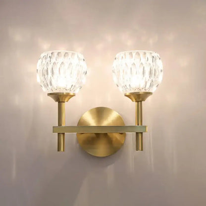 Decorbites gold dimpled glass double-sconce on brass wall mount on Tampa Home & Garden Store