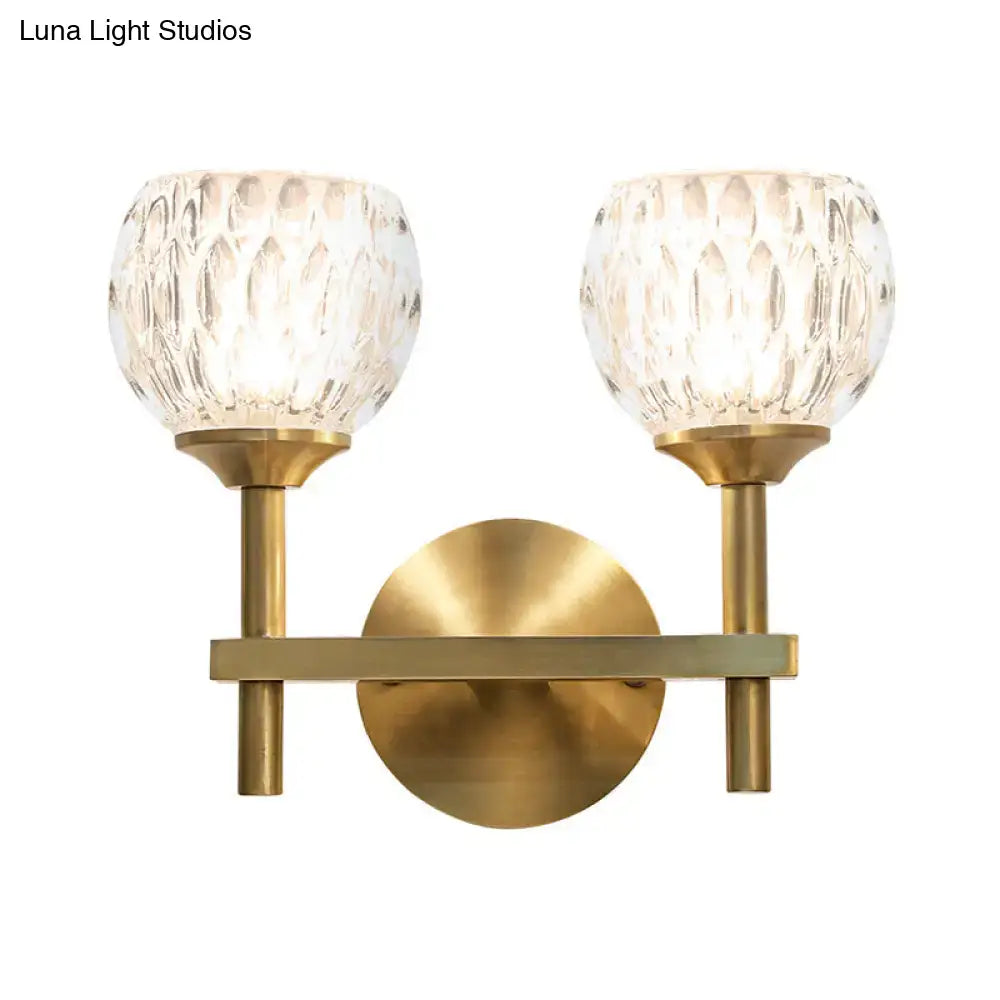 Gold dimpled glass double wall sconce with brass finish and two glass shades Decorbites on Tampa Home & Garden Store