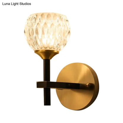 Gold dimpled glass sconce with brass backplate and black stem, Decorbites wall light on Tampa Home & Garden Store