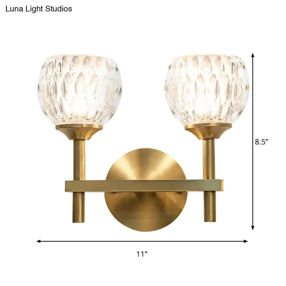 Gold dimpled glass two-light sconce with brass backplate and dual textured shades, wall mount on Tampa Home & Garden Store