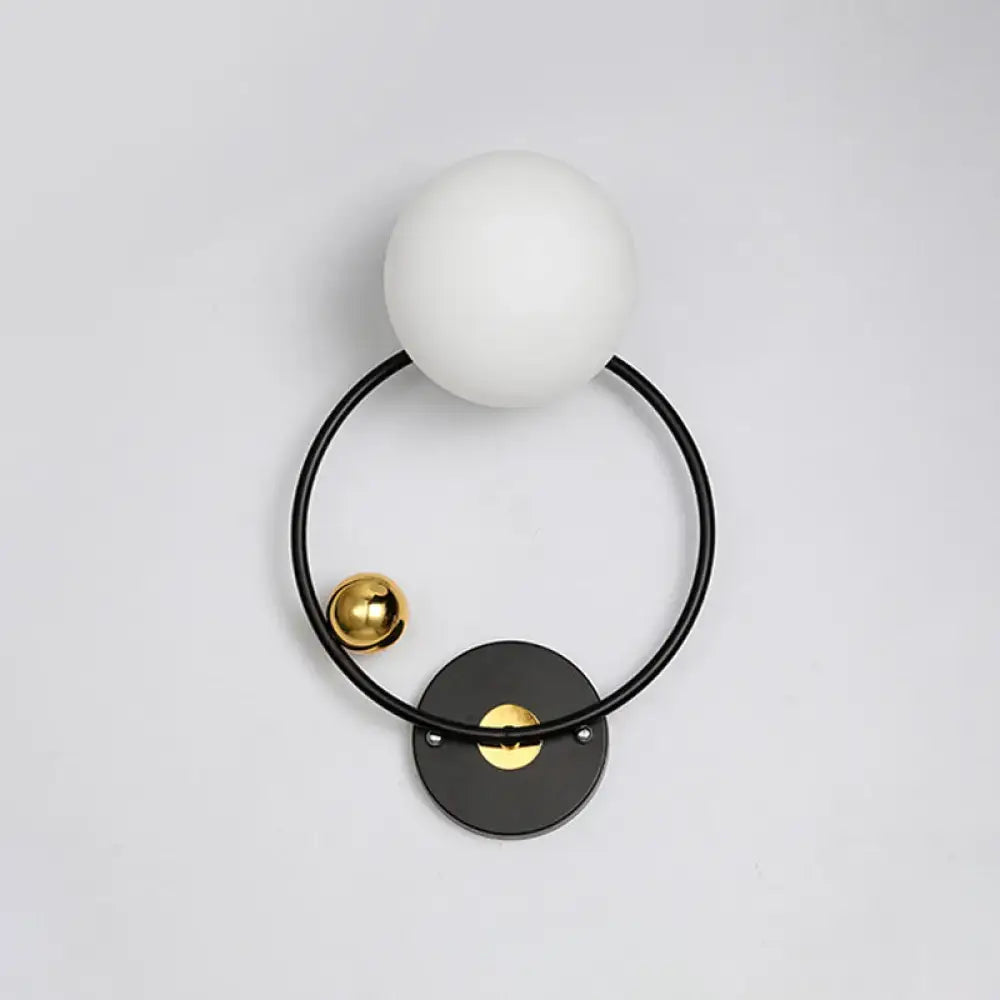 Opal Glass Circular Wall Sconce by Decorbites, black ring with white opal globe and brass accent on Tampa Home & Garden Store
