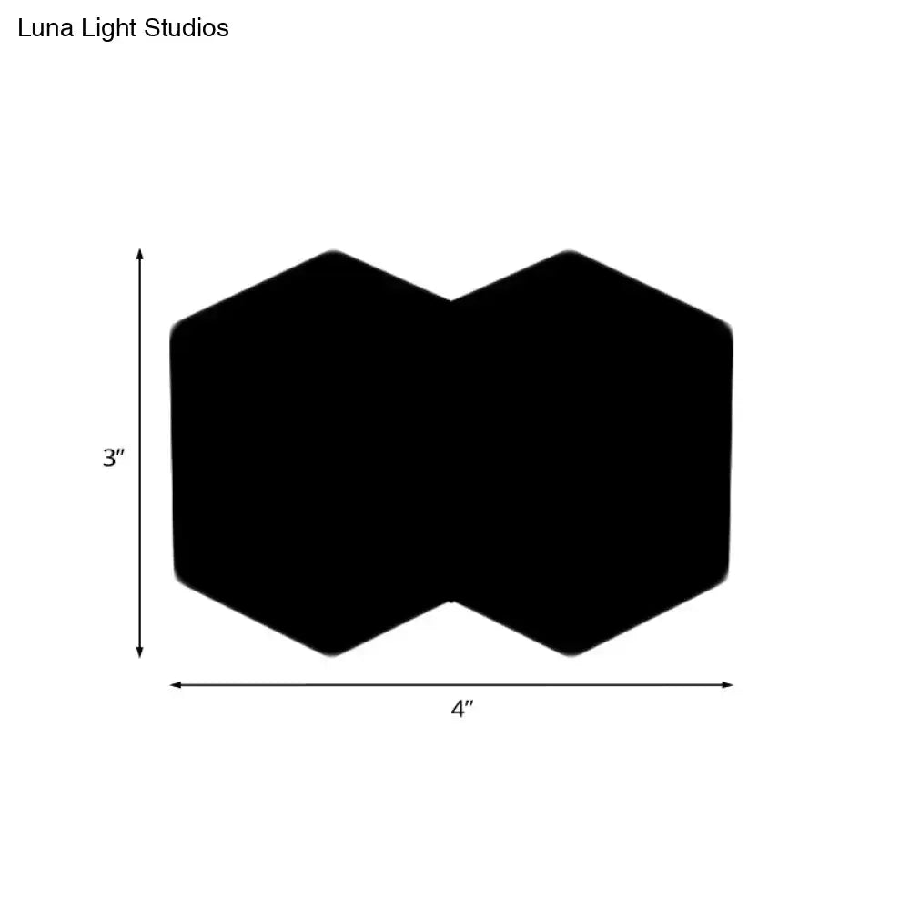Black hexagon wall sconce, Decorbites, double-hex silhouette, 3 in tall by 4 in wide on Tampa Home & Garden Store