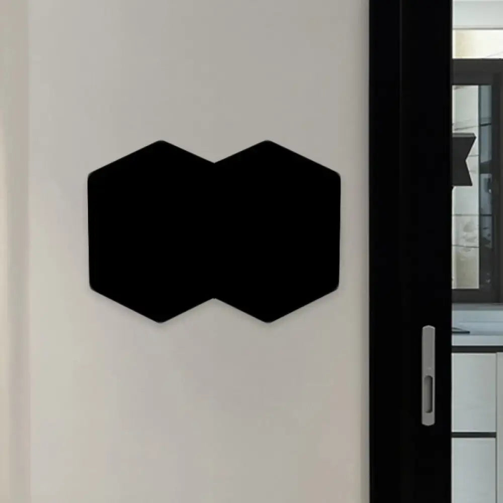 Black hexagon wall sconce by Decorbites, double hexagon silhouette on Tampa Home & Garden Store