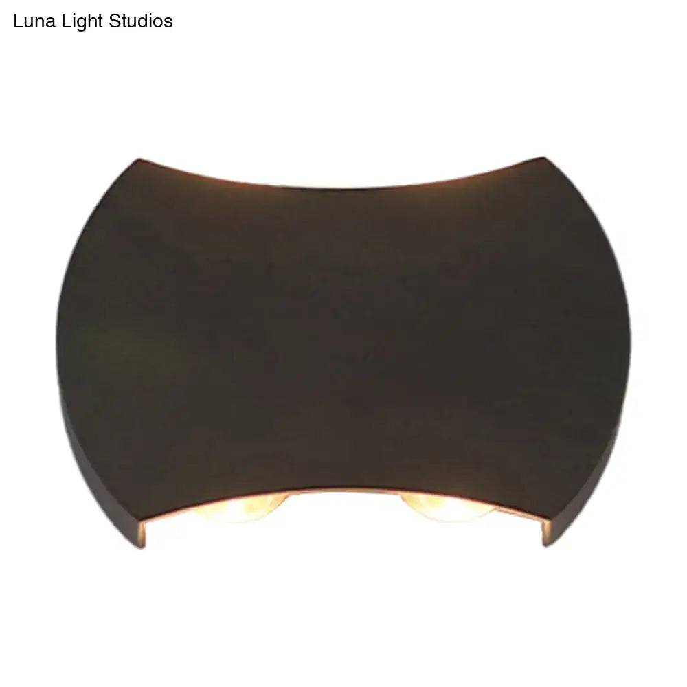 Black LED Wall Washer by Decorbites with curved black housing and warm glow on Tampa Home & Garden Store