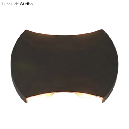 Black LED Wall Washer by Decorbites with curved black housing and warm glow on Tampa Home & Garden Store