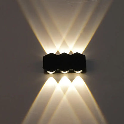 Black LED Wall Washer Decorbites wall light with upward beam pattern on Tampa Home & Garden Store