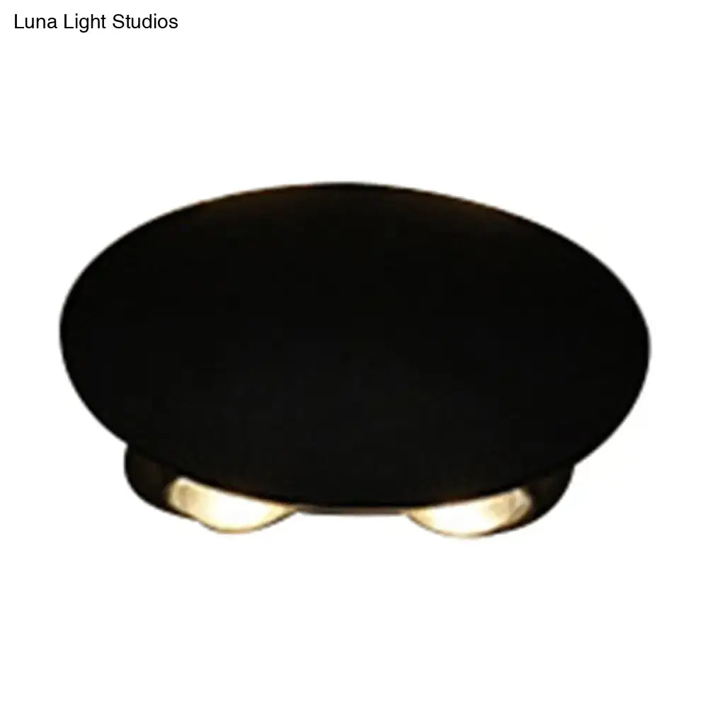 Decorbites Black LED Wall Washer round black fixture with gold feet on Tampa Home & Garden Store