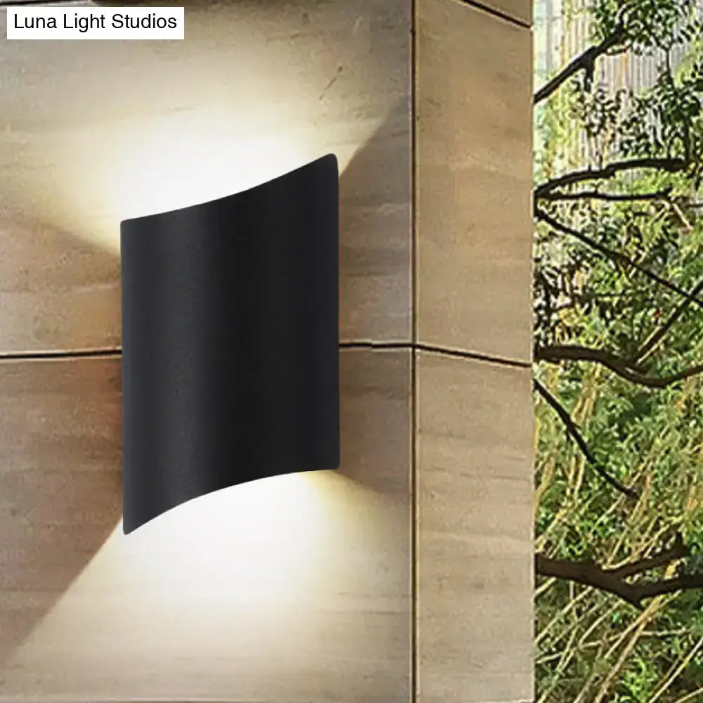 Black Geometric Patio Wall Fixture, curved silhouette outdoor sconce on Tampa Home & Garden Store