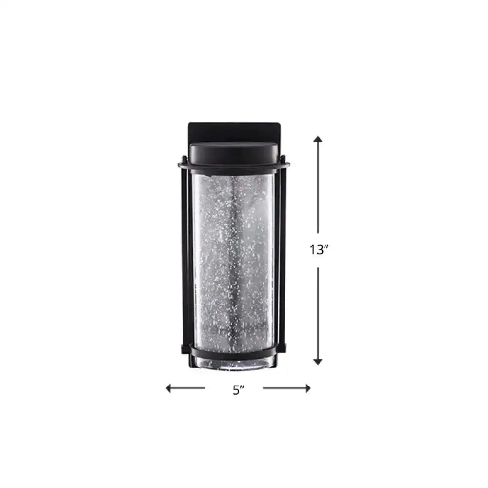 Decorbites black LED outdoor wall sconce with rippled glass cylinder on Tampa Home & Garden Store