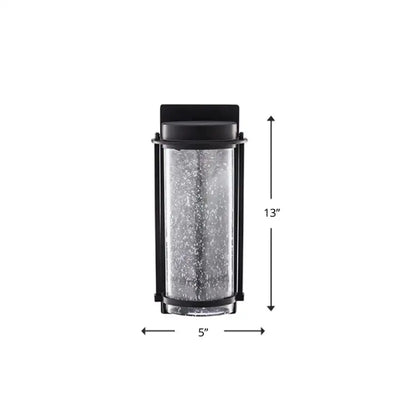 Decorbites black LED outdoor wall sconce with rippled glass cylinder on Tampa Home & Garden Store