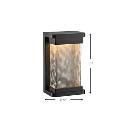 Modern black LED outdoor wall sconce with rippled glass cylinder Decorbites on Tampa Home & Garden Store