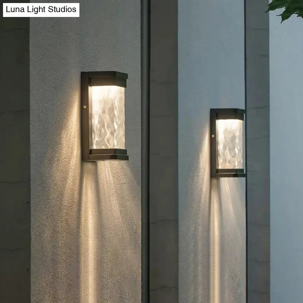 Modern black LED outdoor wall sconce with rippled glass cylinder, wall-mounted pair, Decorbites on Tampa Home & Garden Store