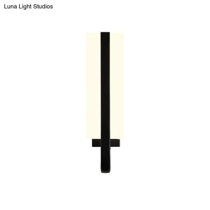Black LED rectangular wall sconce with a vertical frosted panel by Decorbites on Tampa Home & Garden Store