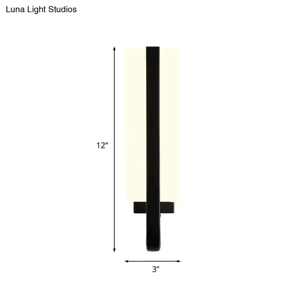 Black LED rectangular wall sconce with black metal frame and white panel, 12in tall on Tampa Home & Garden Store