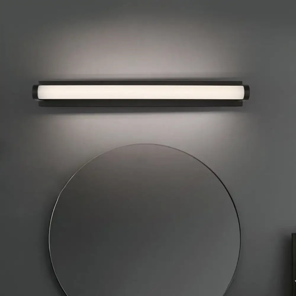 Black tubular vanity sconce by Decorbites with white illuminated tube on Tampa Home & Garden Store