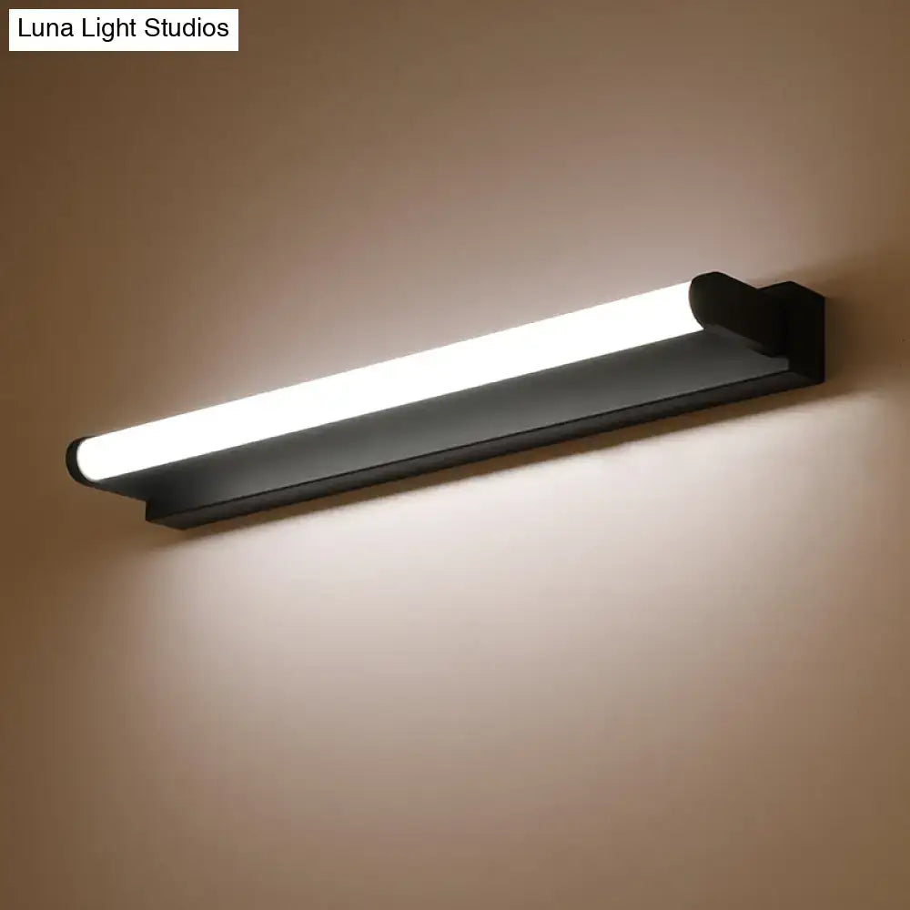Black tubular vanity sconce by Decorbites; elongated LED tube with matte black mount on wall on Tampa Home & Garden Store