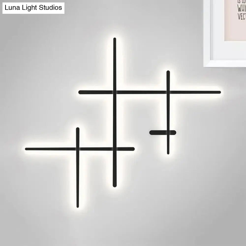 Black Crossed Lines Wall Light by Decorbites; geometric LED wall sconce with intersecting rods on Tampa Home & Garden Store