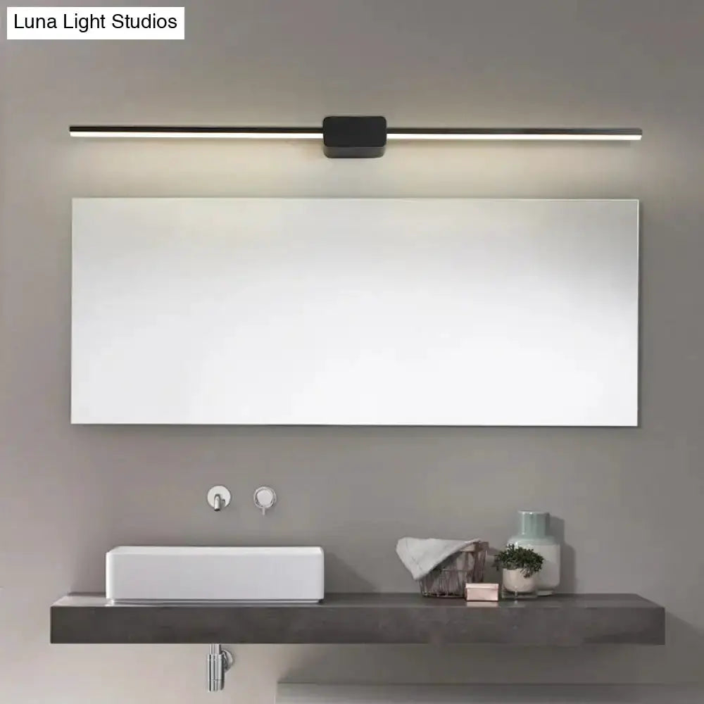 Black linear LED bathroom vanity light sconce mounted above mirror for modern bathroom on Tampa Home & Garden Store