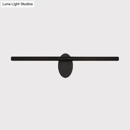 Black oval plate sconce by Decorbites, wall-mounted with a long horizontal bar on Tampa Home & Garden Store
