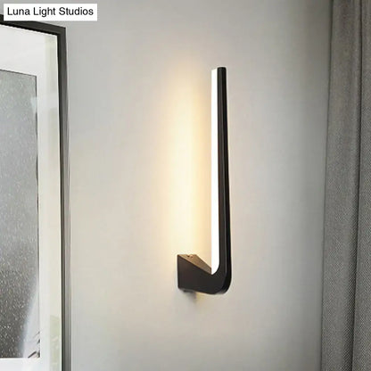 Black Decorbites direct wired sconce with vertical LED light bar in black metal wall-mounted form on Tampa Home & Garden Store