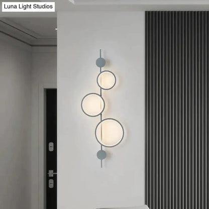Black Long Wall Sconce by Decorbites: modern black metal wall light with circular ring accents on Tampa Home & Garden Store
