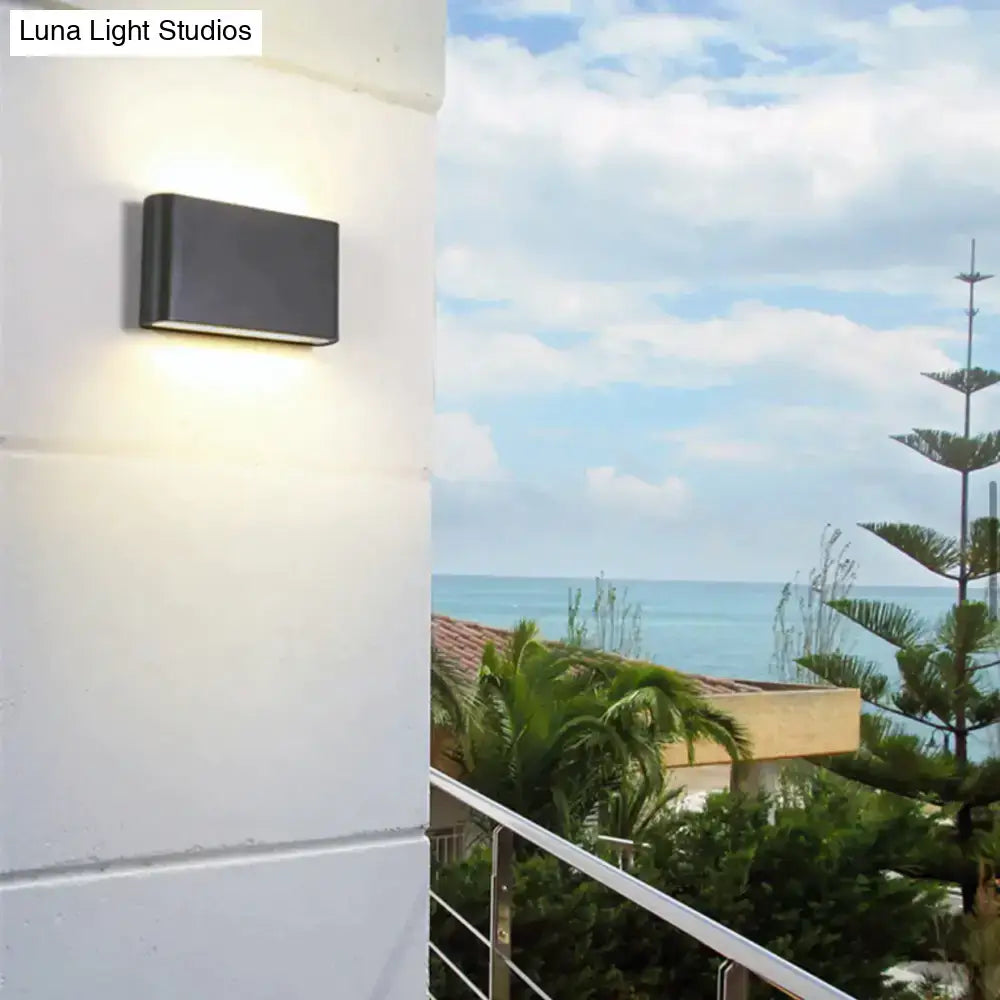 Black outdoor wall light by Decorbites, modern rectangular wall-mount fixture for exterior on Tampa Home & Garden Store