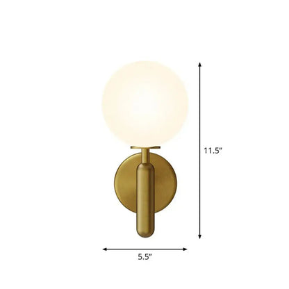 Black Glass Globe Sconce with brass finish wall mount and frosted globe by Decorbites on Tampa Home & Garden Store