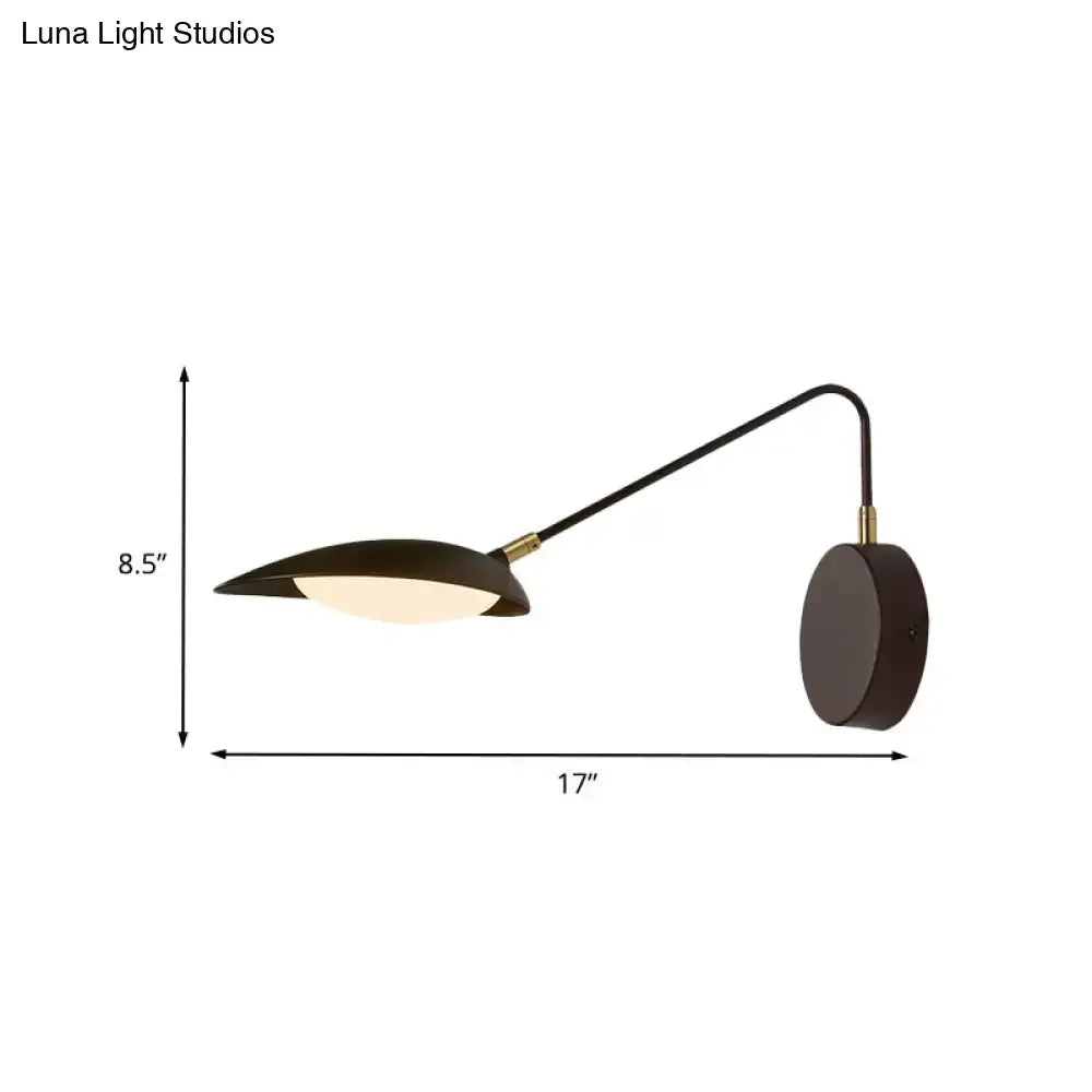 Black adjustable oval reading lamp by Decorbites with curved arm and wall mount on Tampa Home & Garden Store