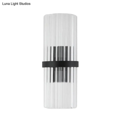 Black crystal wall sconce with clear vertical glass tubes and black metal band Decorbites on Tampa Home & Garden Store