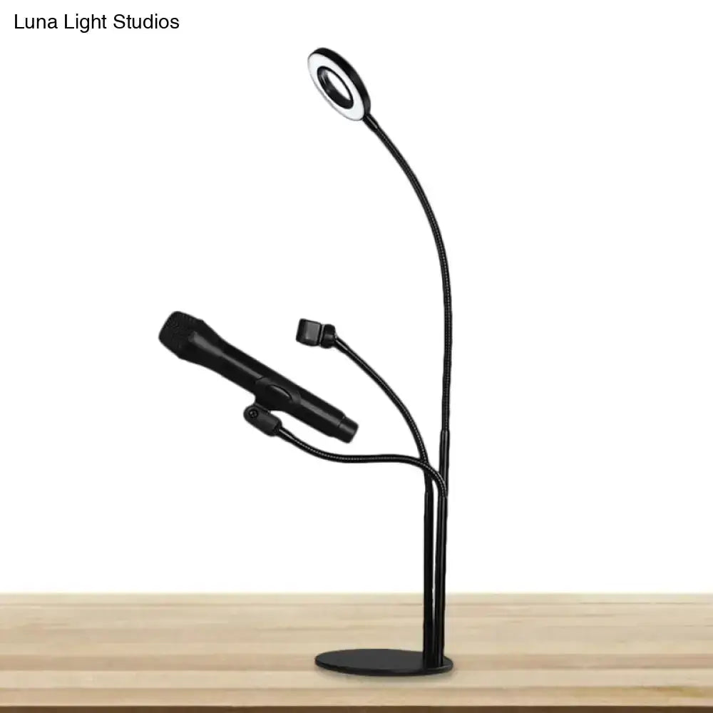Decorbites black metal circular vanity light with desk phone holder and flexible gooseneck on Tampa Home & Garden Store