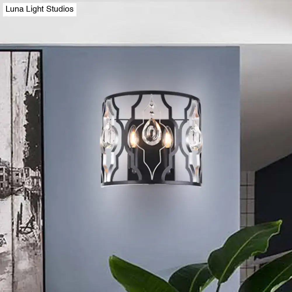 Black crystal droplet wall sconce by Decorbites with metal lattice frame and hanging prisms on Tampa Home & Garden Store