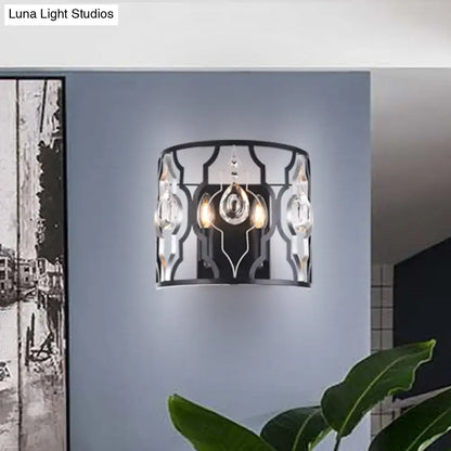 Black crystal droplet wall sconce by Decorbites with metal lattice frame and hanging prisms on Tampa Home & Garden Store