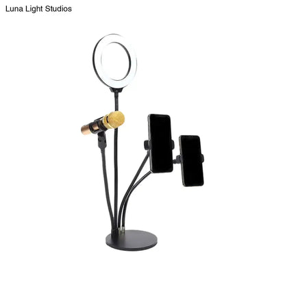 Modern black metal LED ring light stand by Decorbites with microphone and two phone holders on Tampa Home & Garden Store